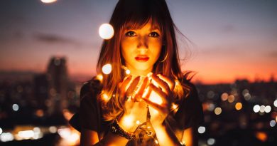 woman holding fireflies